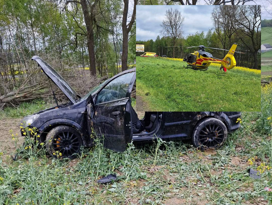 Na zdjęciu zniszczony samochód osobowy po wypadku w Chełmie i śmigłowiec LPR