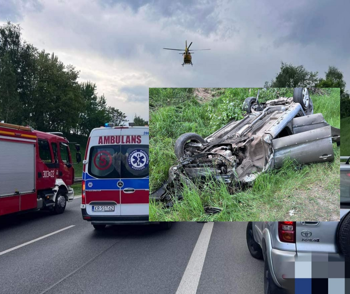 Na zdjęciu lądujacy śmigłowiec LPR i samochód, który dachował w Modlniczce